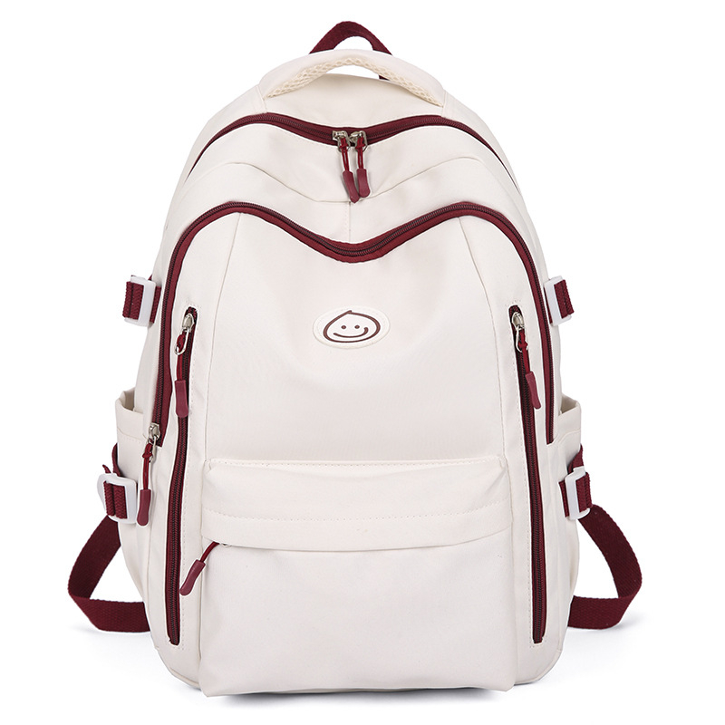 Unisex nailono kuprinė universitetui — ergonominis nugaros skydas, išplėtus talpą, miesto minimalistinis stilius, šypsenėlės spaudas