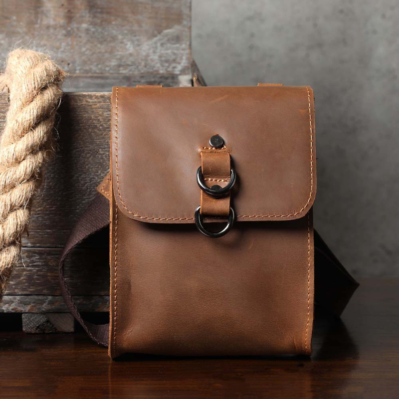 Vyriška pečių rankinė – viršutinis karvės odos sluoksnis (Top Layer Cowhide), Crazy Horse Leather, Crossbody stilius, kišenės telefonui, raktams ir cigaretėms, poliesterio-paminkštintos medžiagos pamušalas