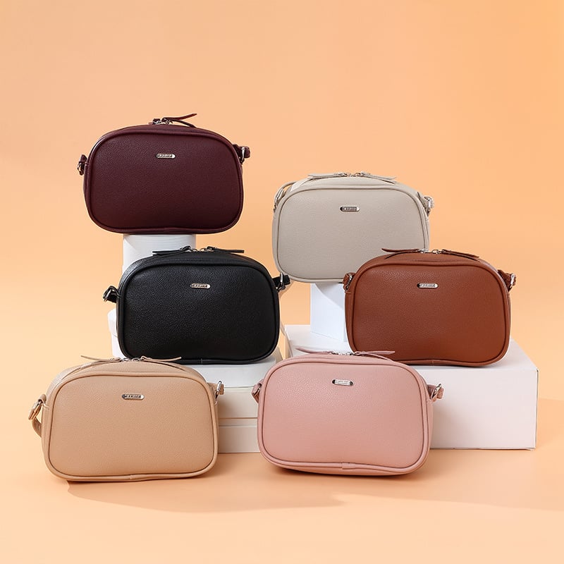 Ženska crossbody torba, PVC, kružnog oblika, zatvarač, najlon podstava, džep za mobitel