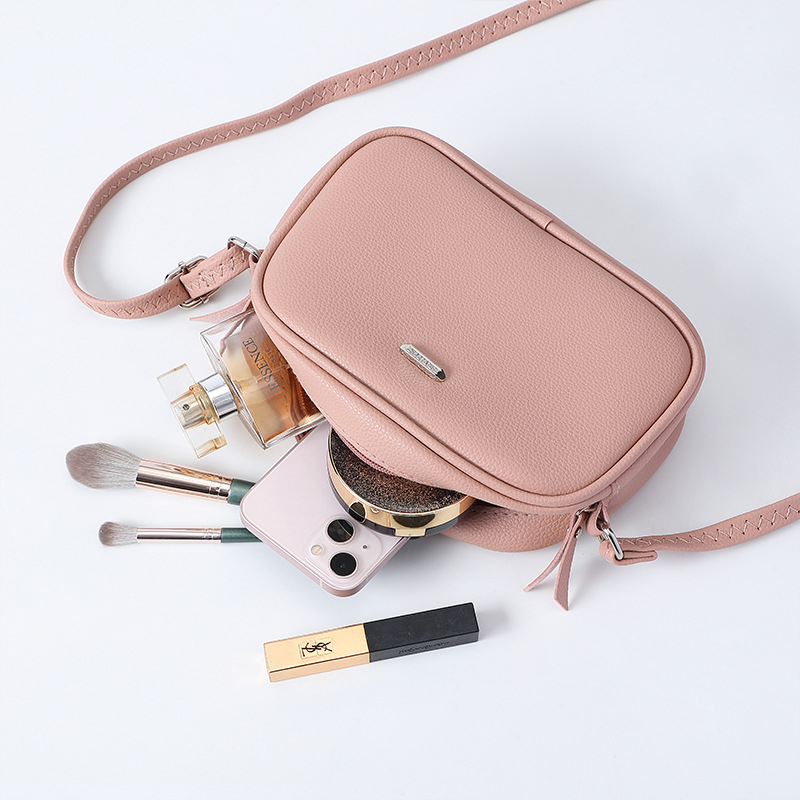 Ženska crossbody torba, PVC, kružnog oblika, zatvarač, najlon podstava, džep za mobitel