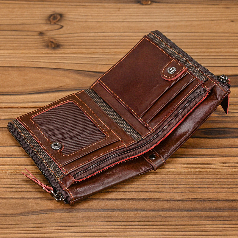 Férfi pénztárca valódi bőrből, RFID védelemmel, kétirányú cipzárral, első réteg tehénbőrből, poliészter bélés