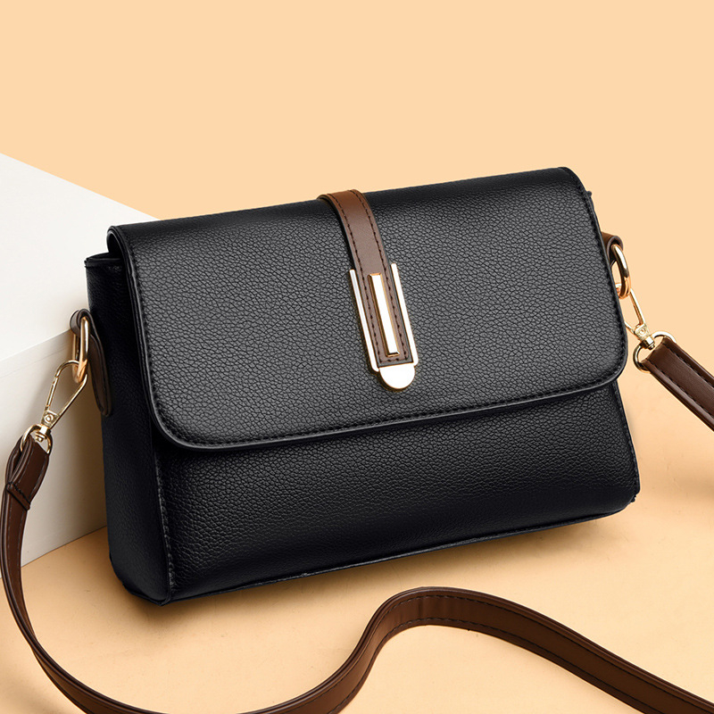 Ženska kvadratna crossbody torba — PU koža, mekana tekstura, zatvarač, poliester podstava, jedna naramenica