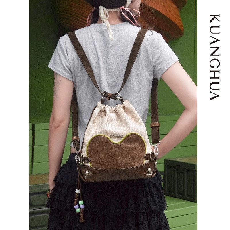 3-u-1 ruksak s vezicama, crossbody i bucket bag; korejski nišni dizajn; materijal PU; kapacitet ispod 20 L; podstava od poliestera.