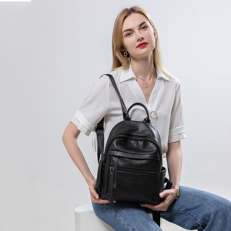 Ženski ruksak s kapacitetom 20-35 L, PU + prava koža; vodootporan, otporan na habanje, zaštita od krađe; jednobojni uzorak, gradski stil