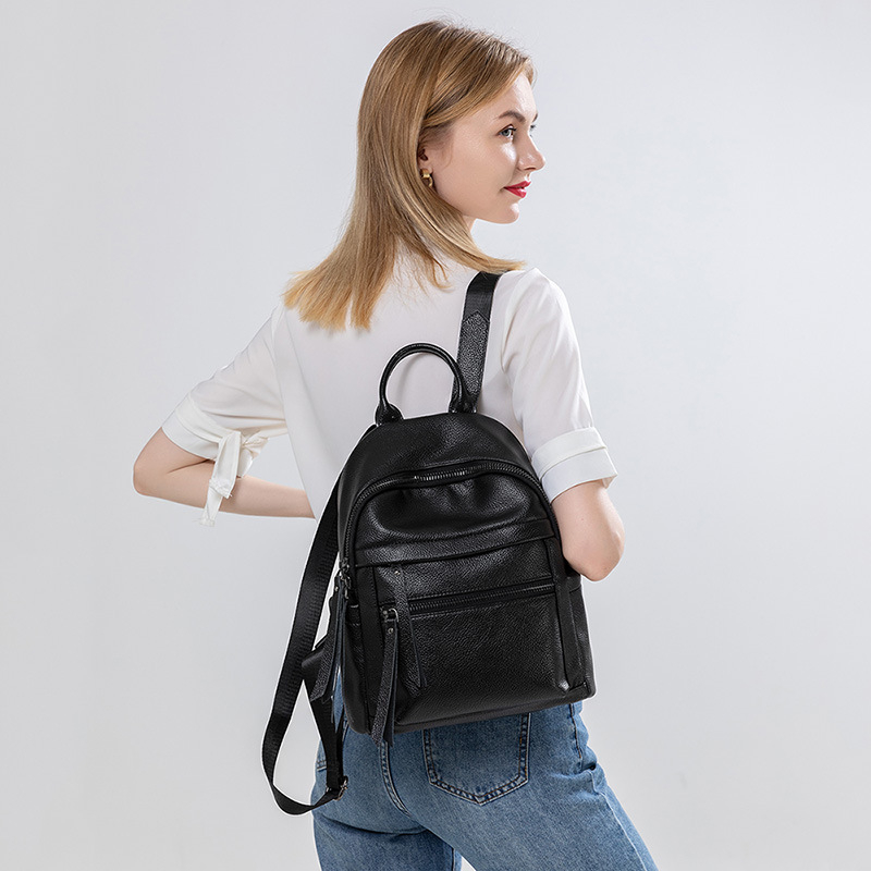 Ženski ruksak s kapacitetom 20-35 L, PU + prava koža; vodootporan, otporan na habanje, zaštita od krađe; jednobojni uzorak, gradski stil