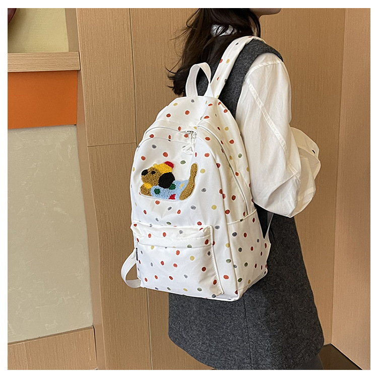 Mergaitėms skirta kuprinė su šuniuko taškų motyvu; didelė talpa, lengva, kvėpuojanti konstrukcija, nailonas, poliesterio pamušalas, laisvalaikio kelionės stilius