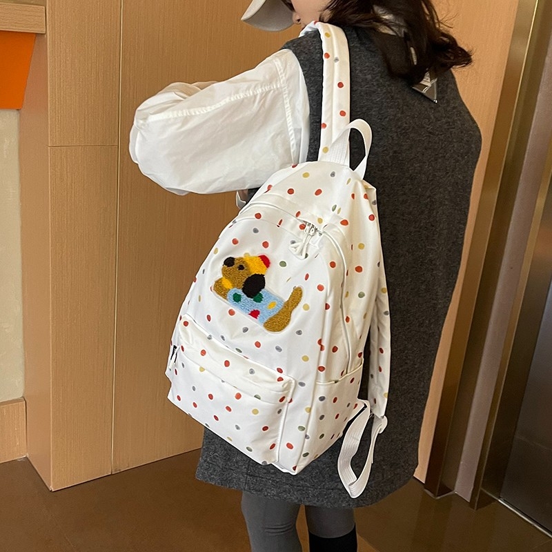 Mergaitėms skirta kuprinė su šuniuko taškų motyvu; didelė talpa, lengva, kvėpuojanti konstrukcija, nailonas, poliesterio pamušalas, laisvalaikio kelionės stilius