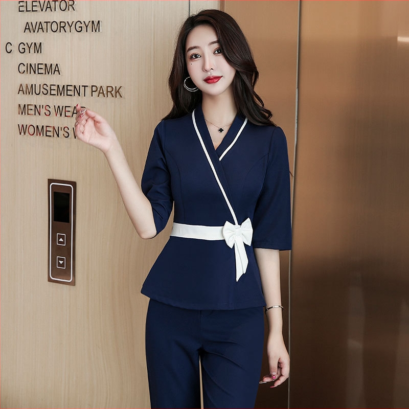 Set uniform pre kozmetický salón pre ženy – top so odvádzaním vlhkosti a nohavice, V‑výstrih, 3/4 rukávy, polyester s obsahom spandexu pod 30%, vhodný pre všetky ročné obdobia