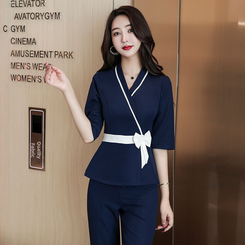 Set uniform pre kozmetický salón pre ženy – top so odvádzaním vlhkosti a nohavice, V‑výstrih, 3/4 rukávy, polyester s obsahom spandexu pod 30%, vhodný pre všetky ročné obdobia