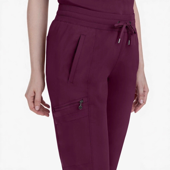 Set unisex de îmbrăcăminte medicală: mâneci scurte, decolteu în V, țesătură cu uscare rapidă, elasticitate în patru direcții.