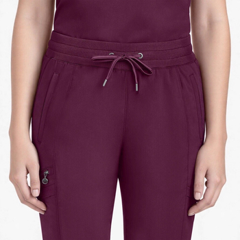 Set unisex de îmbrăcăminte medicală: mâneci scurte, decolteu în V, țesătură cu uscare rapidă, elasticitate în patru direcții.