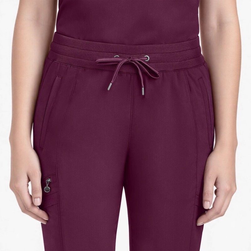 Set unisex de îmbrăcăminte medicală: mâneci scurte, decolteu în V, țesătură cu uscare rapidă, elasticitate în patru direcții.