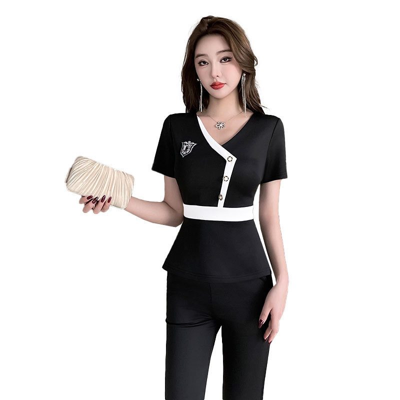 Ženski uniformni set za kozmetičarku – pantalonski kostim za wellness salon, s kratkim rukavima i dugim hlačama, elegantan, model 8607