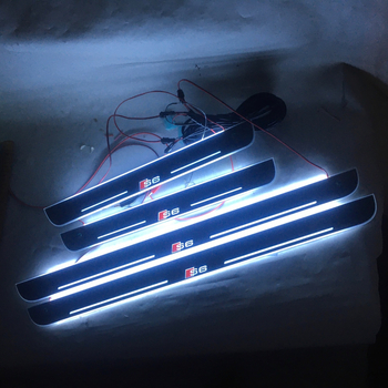 4 gab. bezvadu infrred indukcijas komplekts Audi A6 RS6 ar LED durvju sliekšņiem un sagaidīšanas pedāļiem