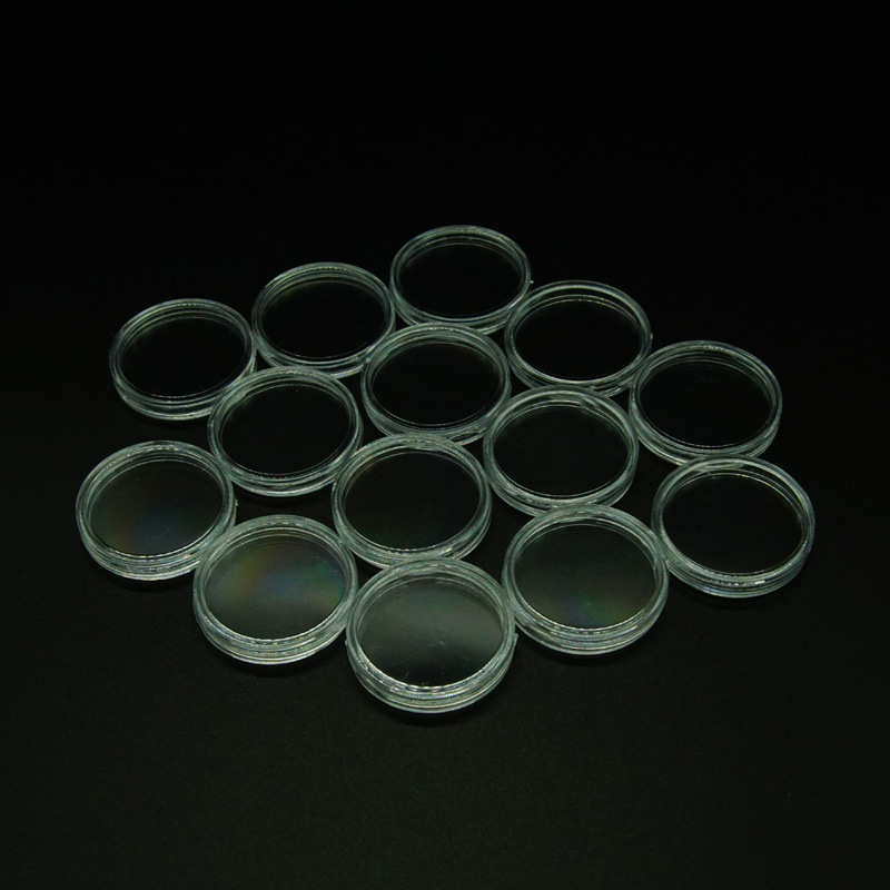 Emlékérme-doboz, átlátszó műanyag, kerek alakú; anyag: PS; csomagolás: műanyag zárófedél; nem ajándék