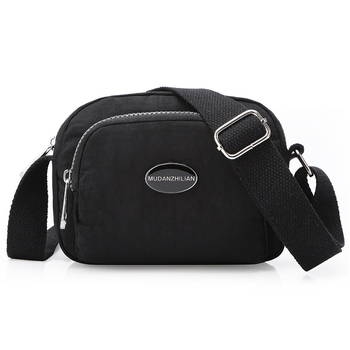 MDZL crossbody kvadratna torbica od najlona, zatvaranje na zip, unutrašnji džepovi: skriveni džep sa zipom, džep za telefon, džep za ID, džep za kameru
