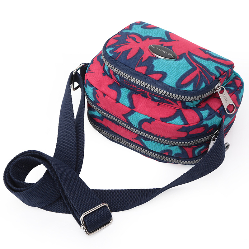 MDZL crossbody kvadratna torbica od najlona, zatvaranje na zip, unutrašnji džepovi: skriveni džep sa zipom, džep za telefon, džep za ID, džep za kameru