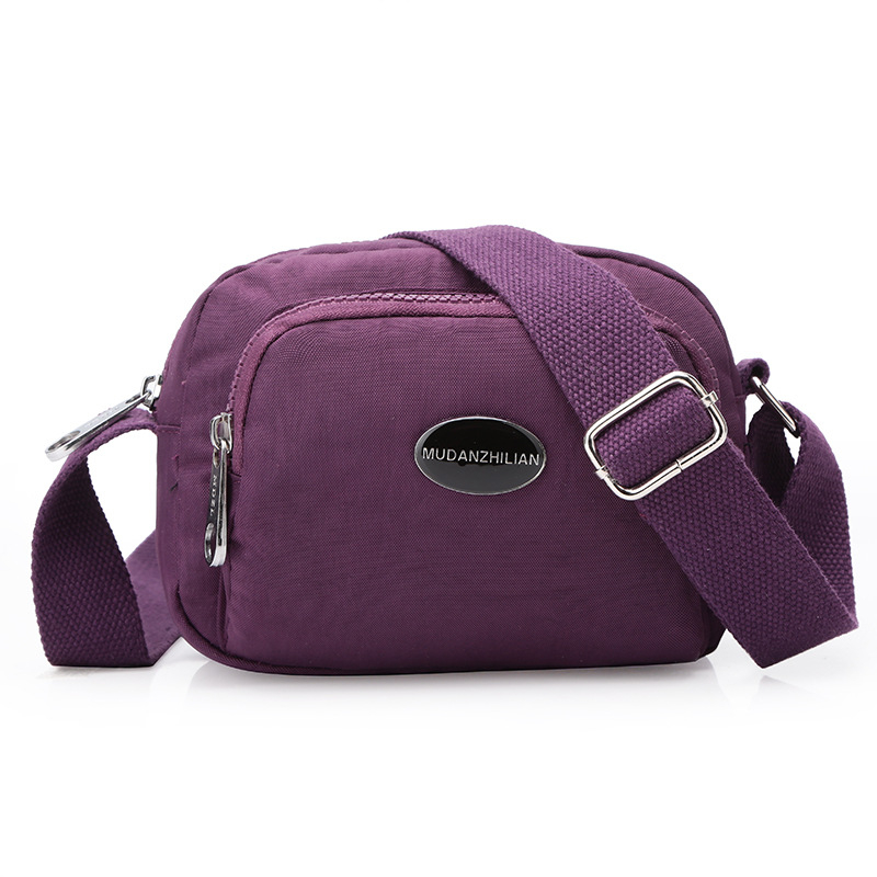 MDZL crossbody kvadratna torbica od najlona, zatvaranje na zip, unutrašnji džepovi: skriveni džep sa zipom, džep za telefon, džep za ID, džep za kameru