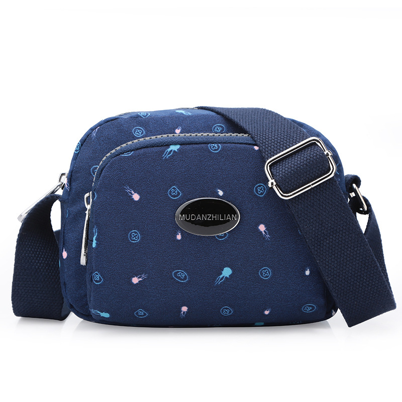 MDZL crossbody kvadratna torbica od najlona, zatvaranje na zip, unutrašnji džepovi: skriveni džep sa zipom, džep za telefon, džep za ID, džep za kameru