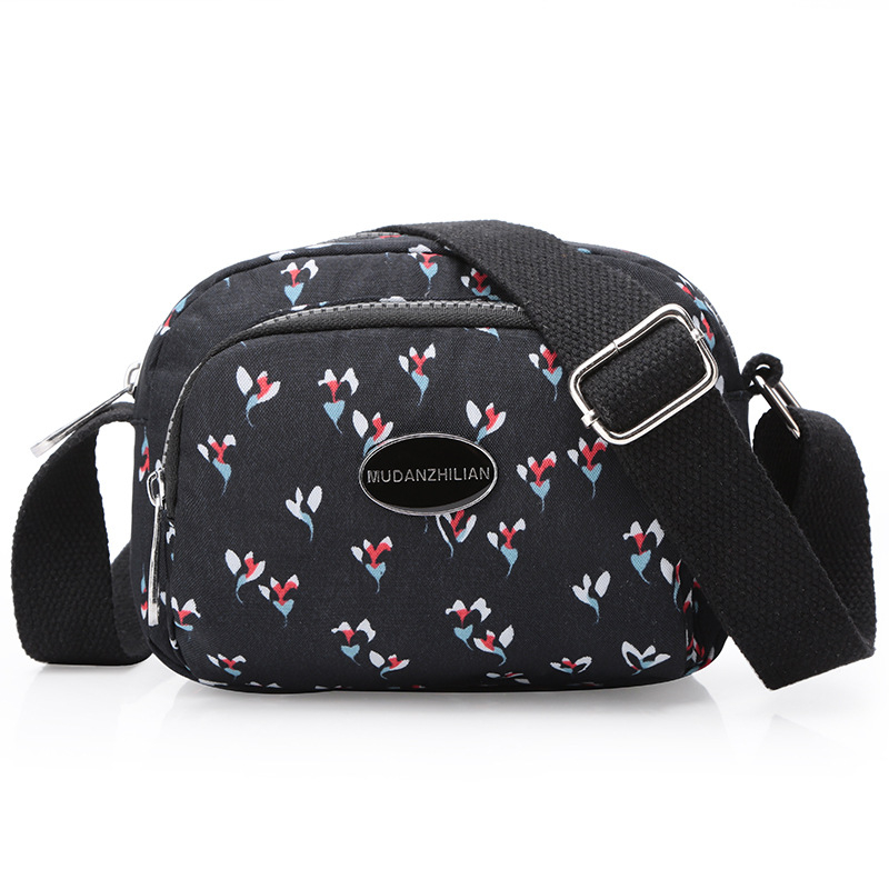 MDZL crossbody kvadratna torbica od najlona, zatvaranje na zip, unutrašnji džepovi: skriveni džep sa zipom, džep za telefon, džep za ID, džep za kameru
