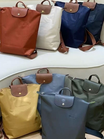 Ghiozdan pliabil, impermeabil din nailon, capacitate 20–35 L, compatibil cu laptop de 14 inch