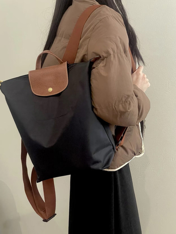 Ghiozdan pliabil, impermeabil din nailon, capacitate 20–35 L, compatibil cu laptop de 14 inch