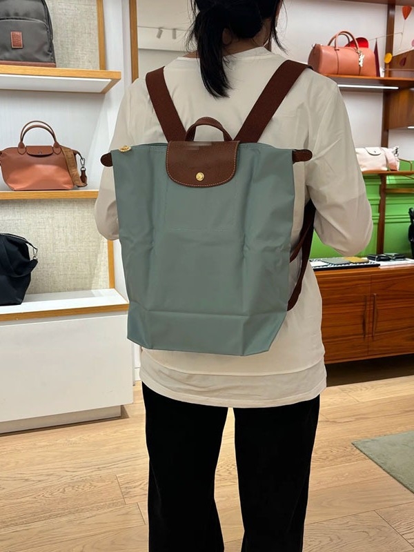 Ghiozdan pliabil, impermeabil din nailon, capacitate 20–35 L, compatibil cu laptop de 14 inch