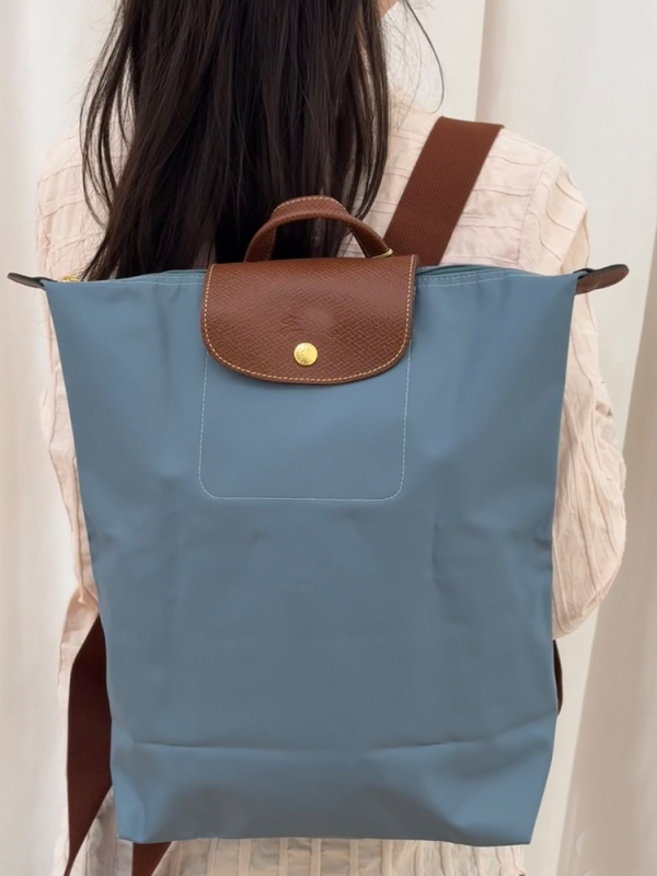 Ghiozdan pliabil, impermeabil din nailon, capacitate 20–35 L, compatibil cu laptop de 14 inch