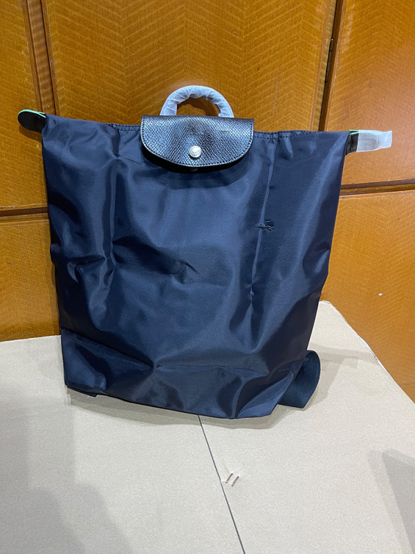 Ghiozdan pliabil, impermeabil din nailon, capacitate 20–35 L, compatibil cu laptop de 14 inch