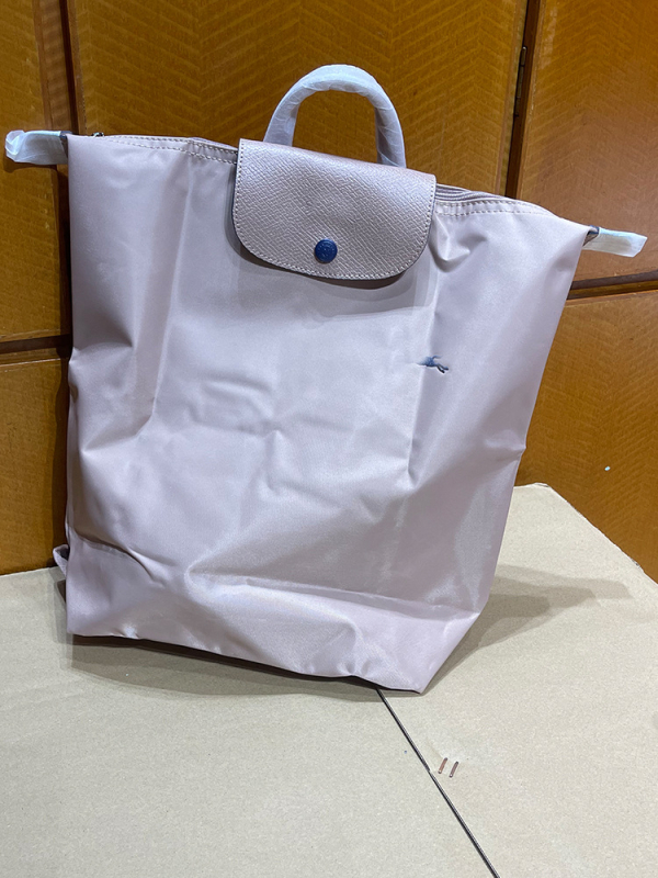 Ghiozdan pliabil, impermeabil din nailon, capacitate 20–35 L, compatibil cu laptop de 14 inch