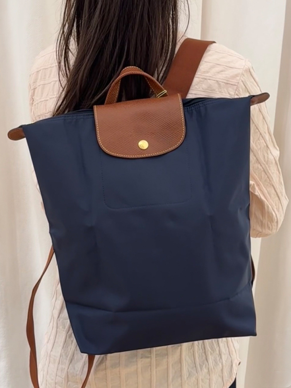 Ghiozdan pliabil, impermeabil din nailon, capacitate 20–35 L, compatibil cu laptop de 14 inch