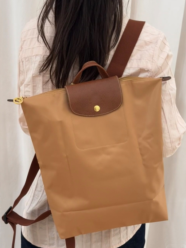 Ghiozdan pliabil, impermeabil din nailon, capacitate 20–35 L, compatibil cu laptop de 14 inch