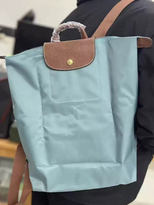 Ghiozdan pliabil, impermeabil din nailon, capacitate 20–35 L, compatibil cu laptop de 14 inch