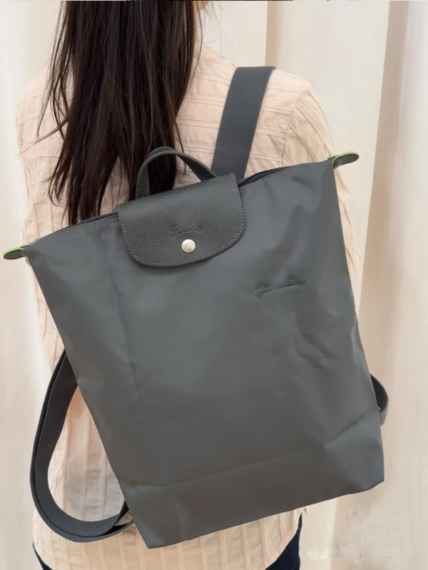 Ghiozdan pliabil, impermeabil din nailon, capacitate 20–35 L, compatibil cu laptop de 14 inch