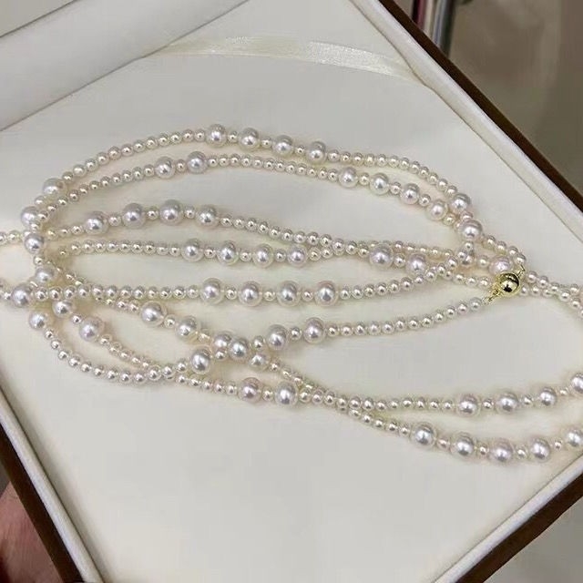 Μακρύς πολυεπίπεδο κολιέ από φυσικά μαργαριάρια γλυκού νερού με χαλκού αλυσίδα - σχήμα κοντά σε κύκλο, 5-6 mm, μήκος 81 cm+