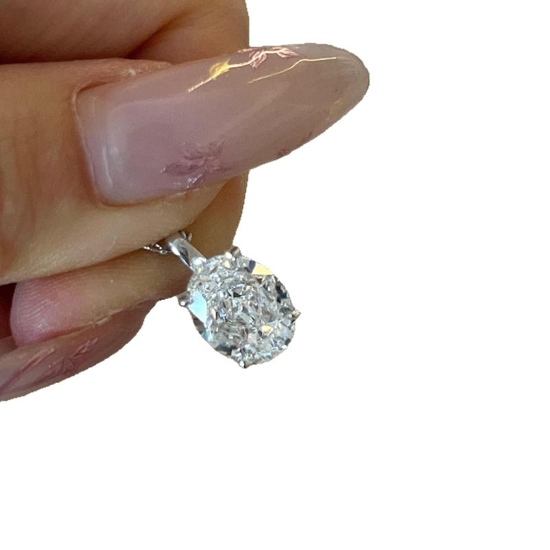 925-ös ezüst nyaklánc tojás alakú medállal, négy karmos rögzítés, kulcscsont- lánc, könnyed luxus stílus