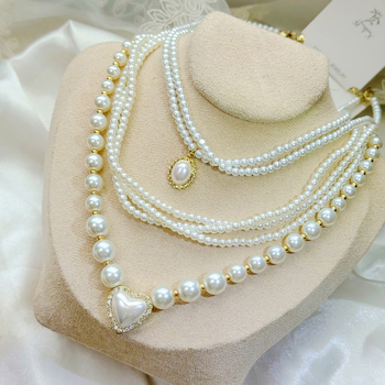 Ogrlica od legure s dijamantima i perlama, geometrijski privjesak, lagani luksuz za žene, ljeto 2025