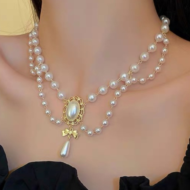 Ogrlica s dvostrukom slojem bisera, privjesak od smole, elektroplatirani završetak, geometrijski dizajn, višeslojna