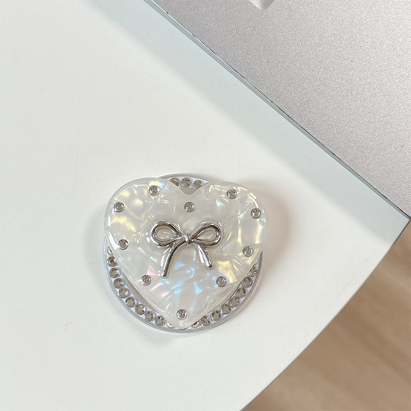 Držač za telefon s rhinestone mašnicom i jastučićem zraka – materijal smola, jednostavan dizajn, MagSafe-kompatibilan, stolni držač