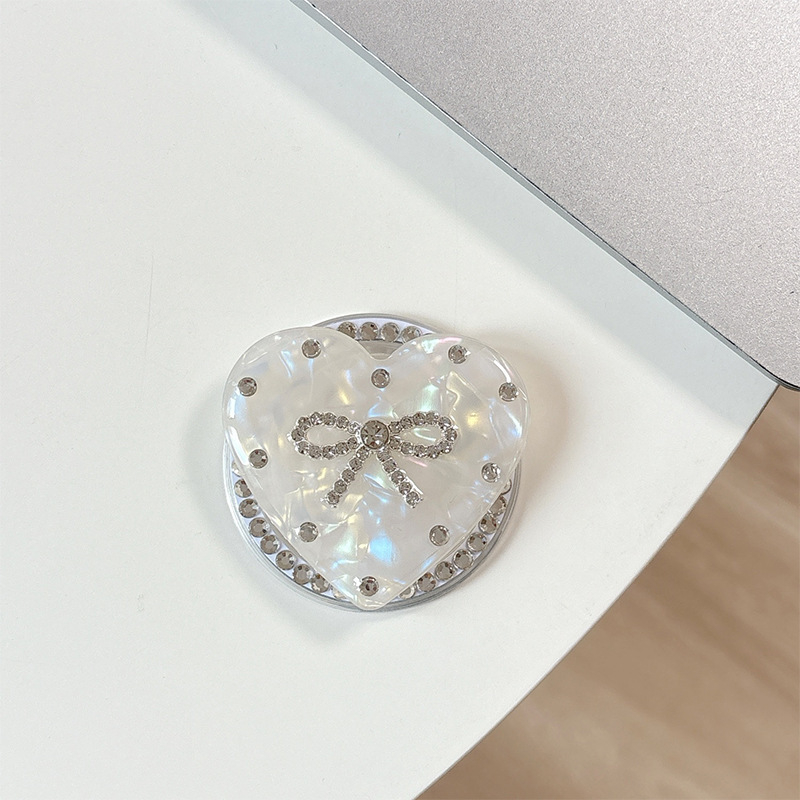 Držač za telefon s rhinestone mašnicom i jastučićem zraka – materijal smola, jednostavan dizajn, MagSafe-kompatibilan, stolni držač