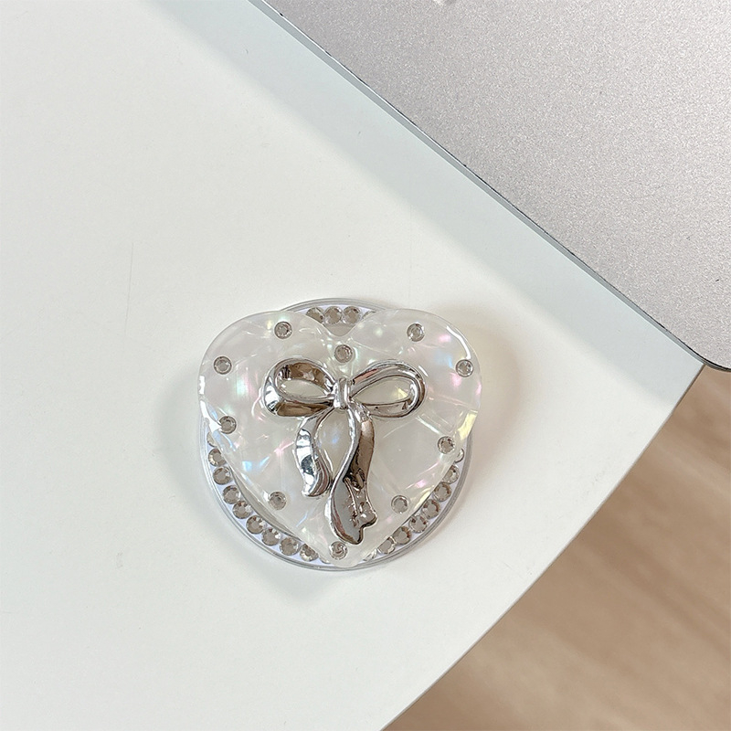 Držač za telefon s rhinestone mašnicom i jastučićem zraka – materijal smola, jednostavan dizajn, MagSafe-kompatibilan, stolni držač