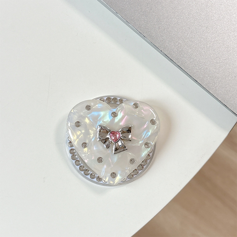 Držač za telefon s rhinestone mašnicom i jastučićem zraka – materijal smola, jednostavan dizajn, MagSafe-kompatibilan, stolni držač