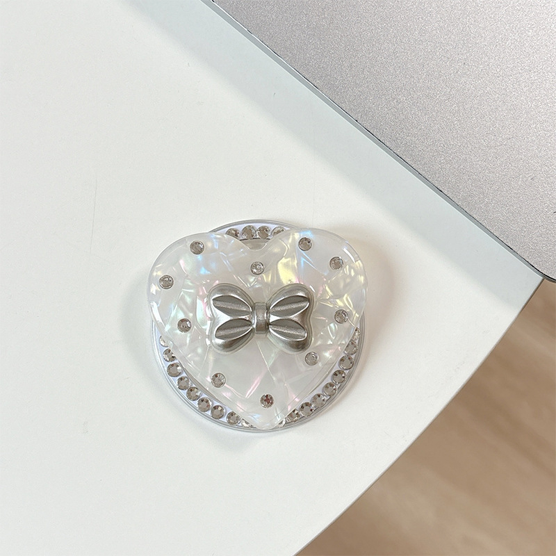 Držač za telefon s rhinestone mašnicom i jastučićem zraka – materijal smola, jednostavan dizajn, MagSafe-kompatibilan, stolni držač