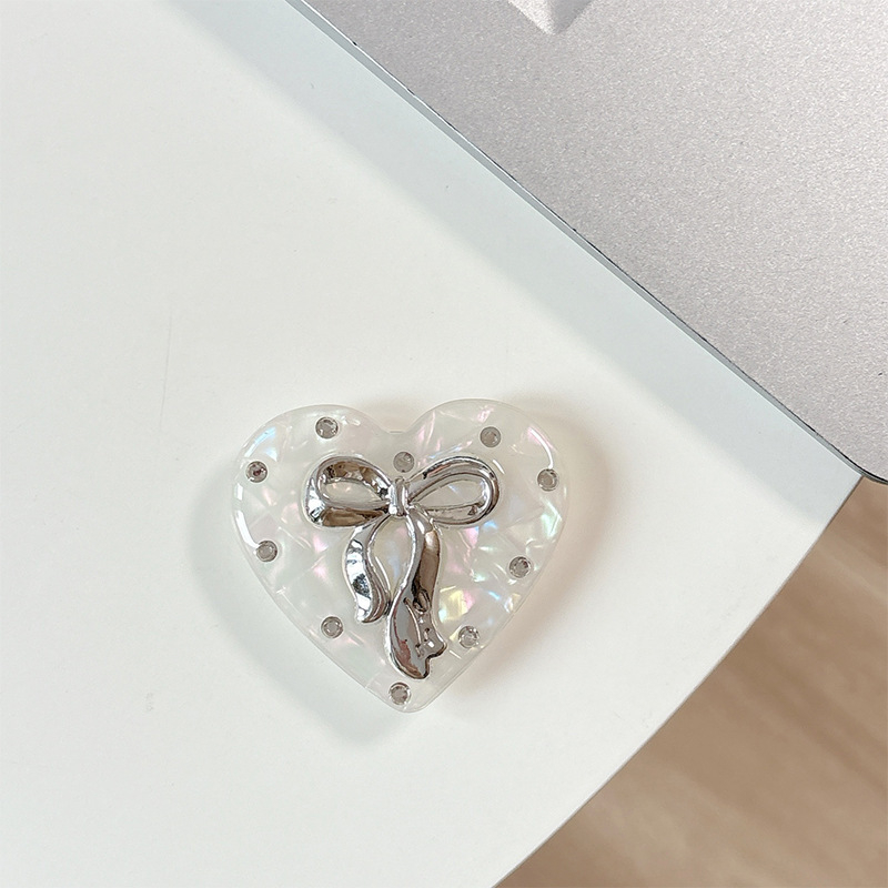 Držač za telefon s rhinestone mašnicom i jastučićem zraka – materijal smola, jednostavan dizajn, MagSafe-kompatibilan, stolni držač
