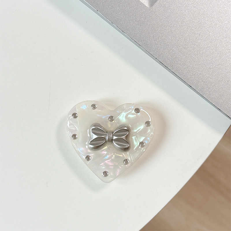 Držač za telefon s rhinestone mašnicom i jastučićem zraka – materijal smola, jednostavan dizajn, MagSafe-kompatibilan, stolni držač