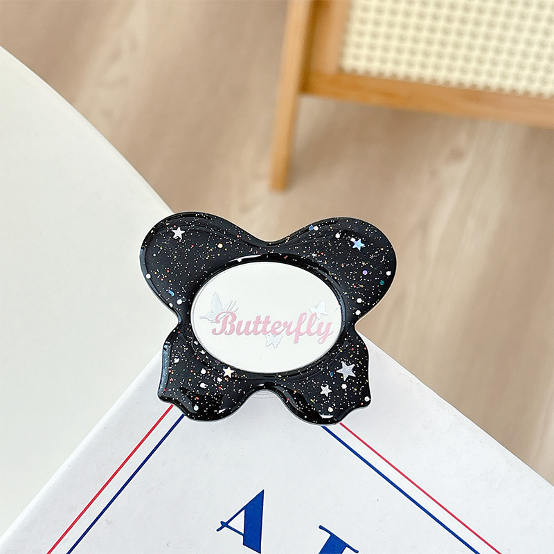 Asztali telefon-tartó csillogó pillangó díszítéssel, kis tükrövel, teleszkópos kar, ragasztóval rögzíthető, műanyag, univerzális kialakítás