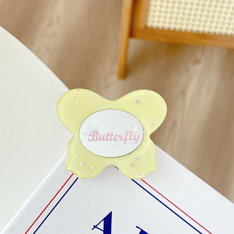 Asztali telefon-tartó csillogó pillangó díszítéssel, kis tükrövel, teleszkópos kar, ragasztóval rögzíthető, műanyag, univerzális kialakítás