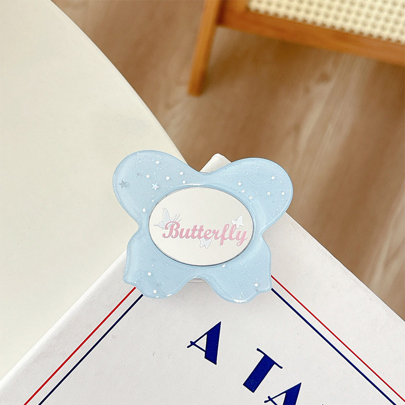 Asztali telefon-tartó csillogó pillangó díszítéssel, kis tükrövel, teleszkópos kar, ragasztóval rögzíthető, műanyag, univerzális kialakítás