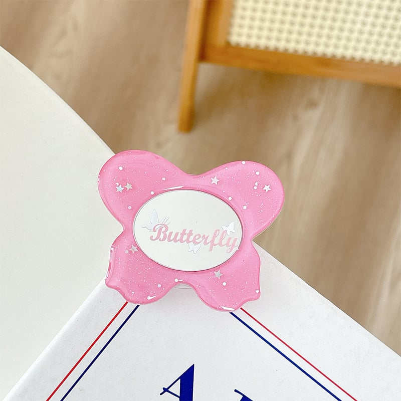 Asztali telefon-tartó csillogó pillangó díszítéssel, kis tükrövel, teleszkópos kar, ragasztóval rögzíthető, műanyag, univerzális kialakítás