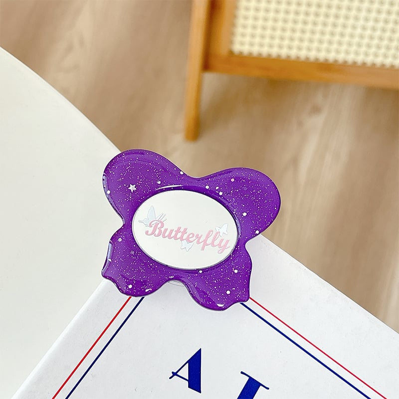 Asztali telefon-tartó csillogó pillangó díszítéssel, kis tükrövel, teleszkópos kar, ragasztóval rögzíthető, műanyag, univerzális kialakítás